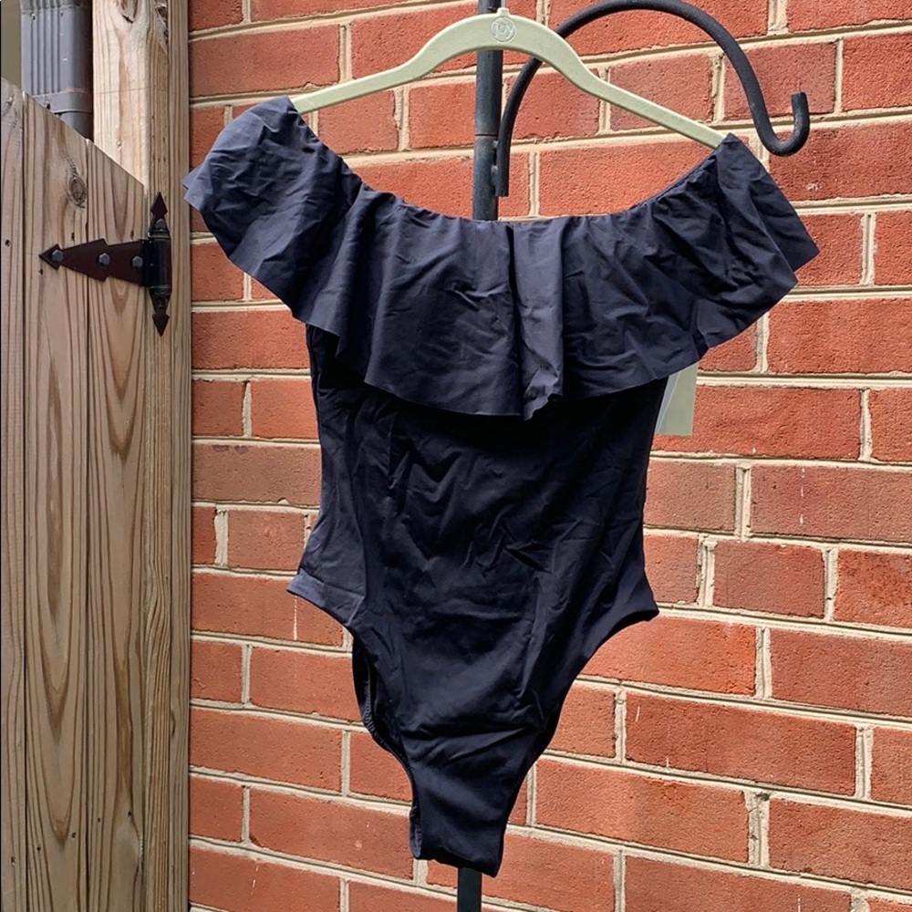 Trina Turk black ruffle swim suit size 4